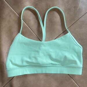 Women’s green Lululemon Flow Y Sports bra